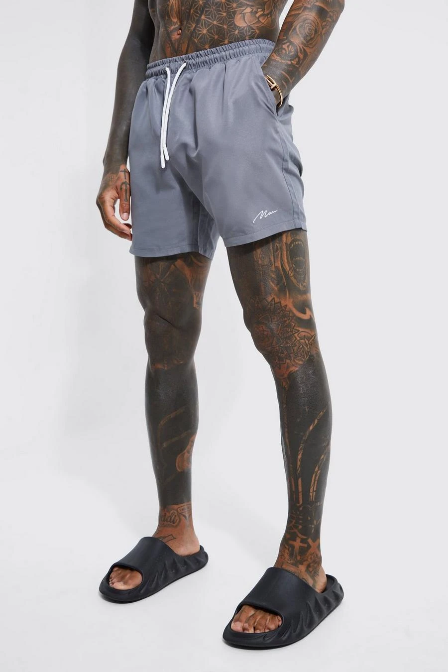 Man Signature Mid Length Swim Shorts 1 Man Signature Mid Length Swim Shorts